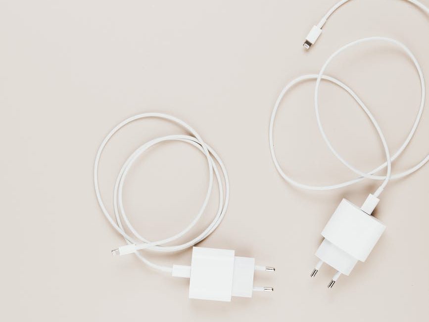 flat lay shot of two white chargers